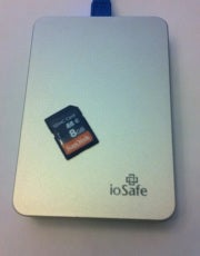 You could use a portable USB drive or SD memory card to transport data between devices, but that's not so elegant.